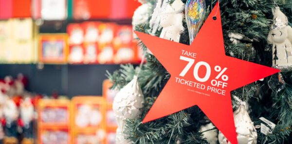 Americans are tiptoeing out of economic turmoil this holiday shopping season